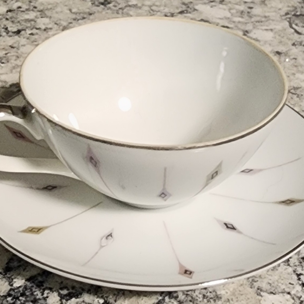 Harmony House Classic White and Cream Teacup and Saucer Set